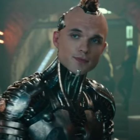 Ed Skrein as a robotic body with a Mohawk.